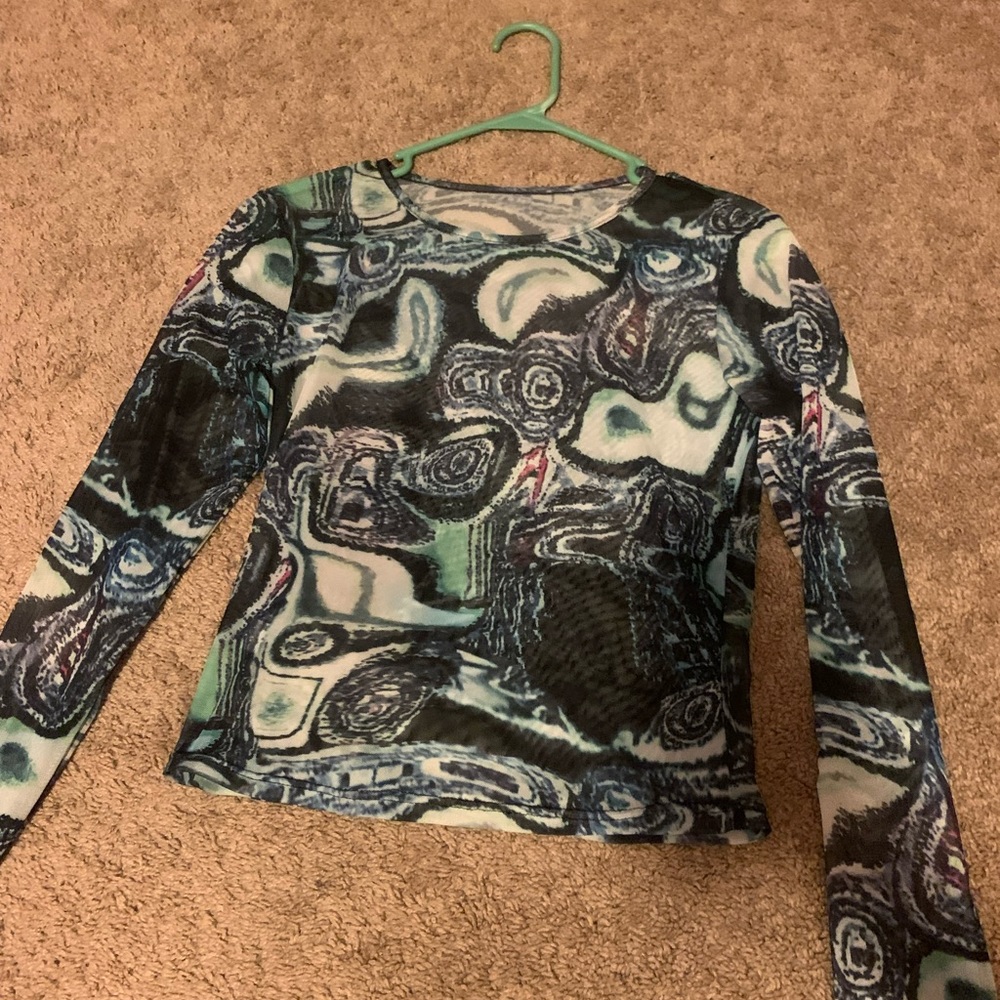 Long sleeve multi color top, sheer(see through), and medium.